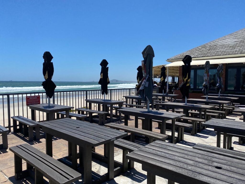 Recycled Plastic Outdoor Furniture in South Africa: The Complete Buyer's Guide (picnic tables at a restaurant)